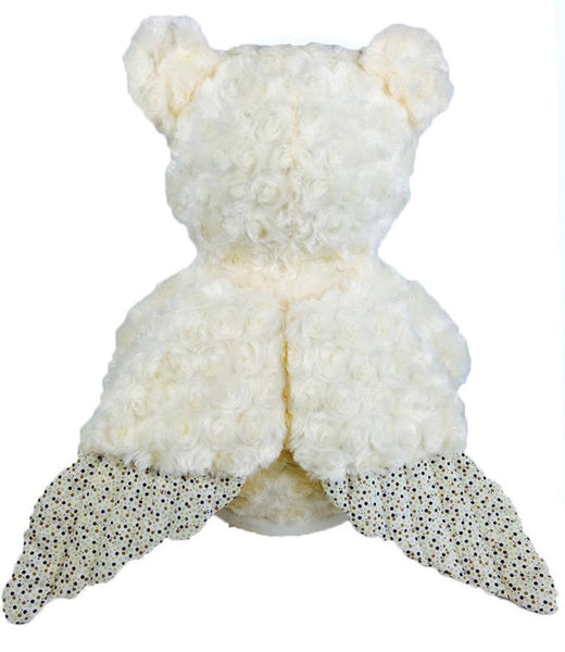 The back view of a cream coloured angel teddy bear plushie. It has cream coloured wings attached that are tipped with a beige spot fabric.