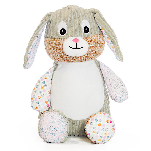 Grey bunny plushie teddy with accent fabric on legs and ears of pink and silver swirls and pink, mint and silver spots, with a white belly ready to be personalised