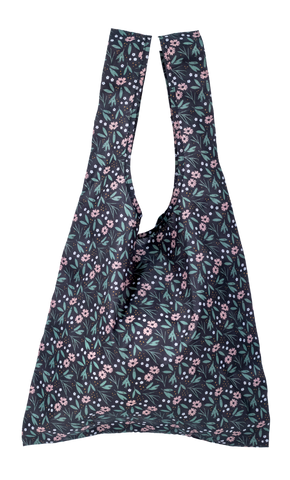 Reusable shopper bag in a black floral print.