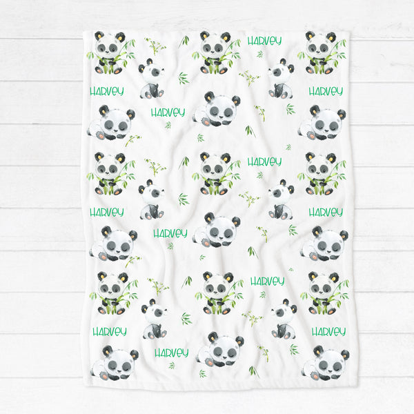Personalised fleece minky blanket with a black and white panda in various positions eating bamboo