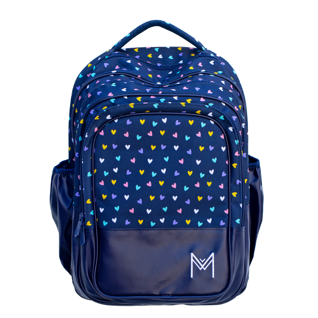 Montiico Backpack with dark blue background covered in a pattern of multi-coloured small hearts
