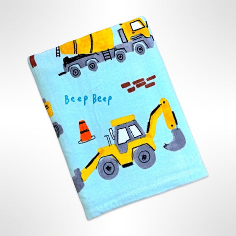 Children's personalised beaach towel with various yellow construction vehicles on an aqua blue background.
