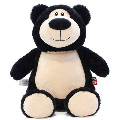 Black coloured teddy bear with a light beige face, tummy and feet pads that has a large black coloured nose and goofy smile. The beige coloured tummy is blank and ready to be personalised.