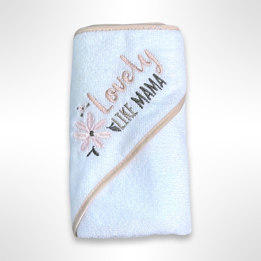 White personalised baby hooded towel with a white hood with embroidery of the words Lovely Like Mama.