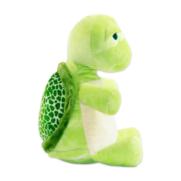 Side view of a green turtle plushie with a blank belly ready to be embroidered.