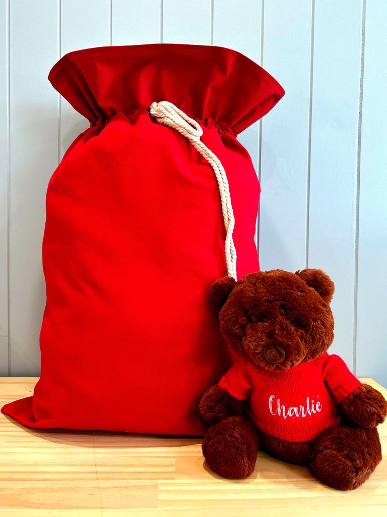 Personalised red santa sack with rope tie.