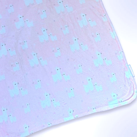 Double layer personalised minky blanket with white llama on a light pink background, ready to be personalised with a name using embroidery.