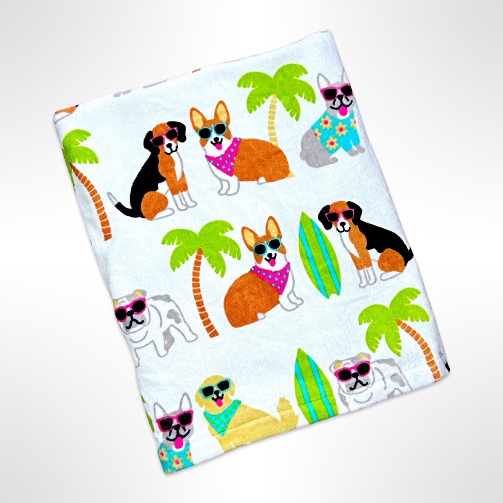 Large personalised beach towel with various breeds of dogs all wearing sunglasses, standing among palm trees and surfboards, all on a white background.