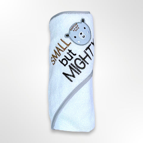 White personalised baby hooded towel. The hood has a grey bear head with the words small but mighty.