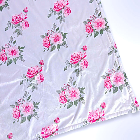 Double layer minky fleece blanket bunches of pink roses on a light pink background ready to be personalised with an embroidered name