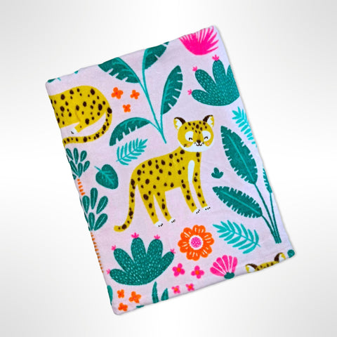 Personalised childrens beach towel with tigers strolling through a jungle on a light pink background