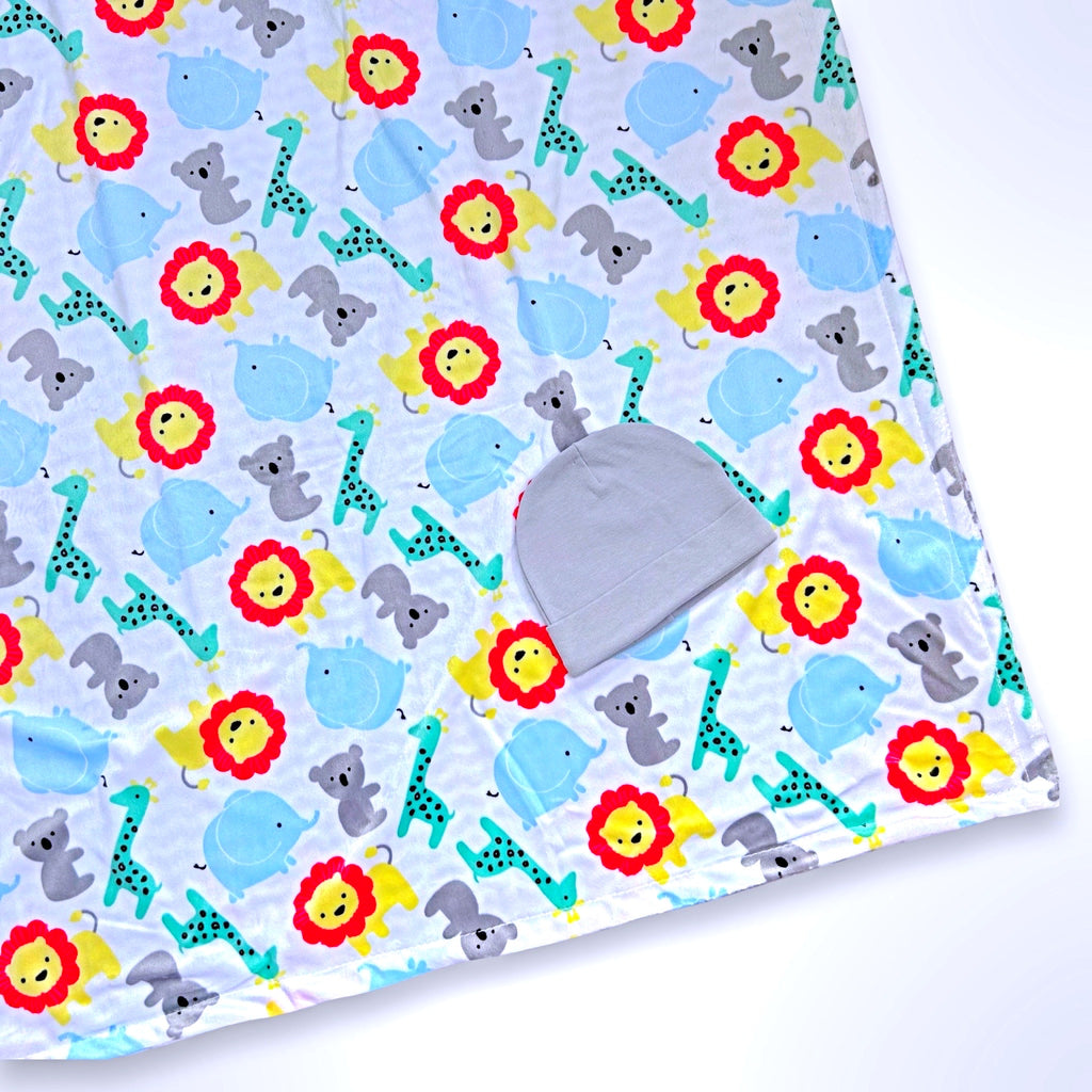 Double layer minky blanket with koala, giraffes, lions and elephants on a white background, ready to be personalised with a name.