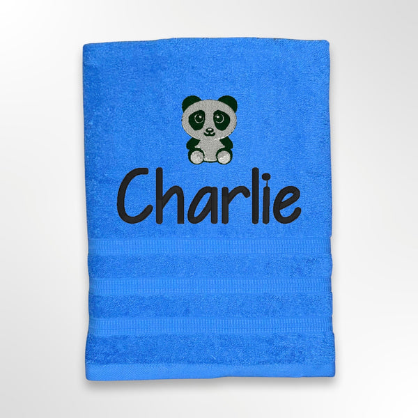 Blue towel personalised with child's name and embroidered black and white panda