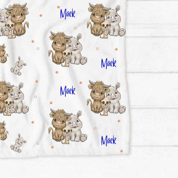 Personalised fleece minky blanket with a trio of African animals - a cow / buffalo, hippopotamus and meerkat
