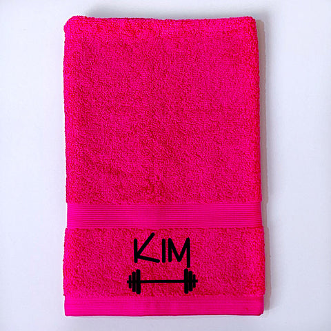 Pink gym towel or sports towel personalised with a name and dumbbell weight bar