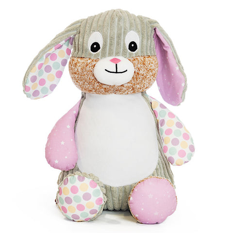 Grey bunny plushie teddy with accent fabric on legs and ears of pink and white stars and pink, mint and yellow spots, with a white belly ready to be personalised