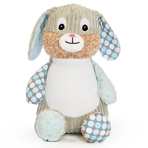 Grey bunny plushie teddy with accent fabric on legs and ears of blue spots and stars, with a white belly ready to be personalised