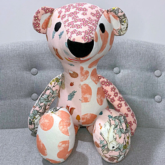 Memory keepsake teddy bear made from baby onesies, bodysuits