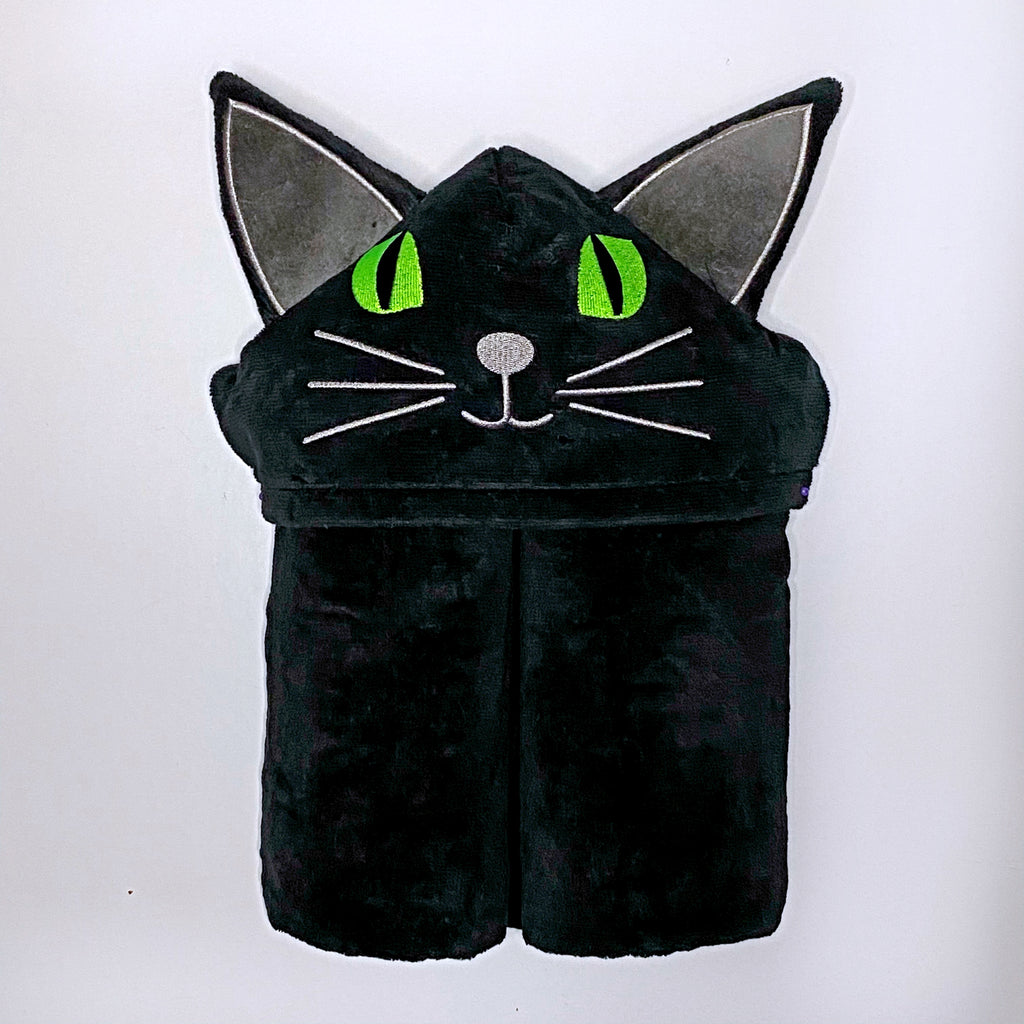 Children's hooded bath towel of a black cat with green eyes, personalised with a name.
