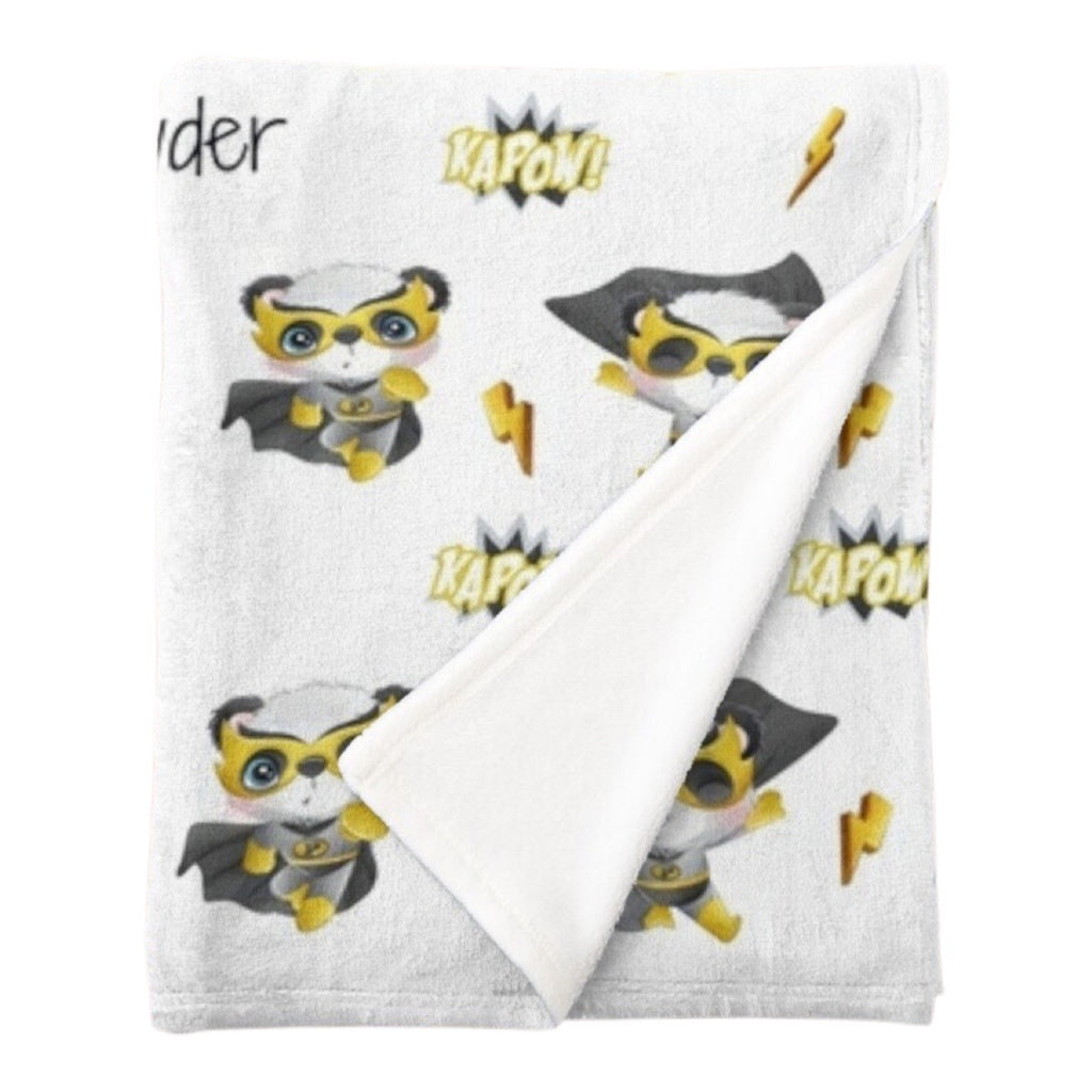 Personalised fleece minky blanket with a panda superhero in a yellow, black and  grey outfit