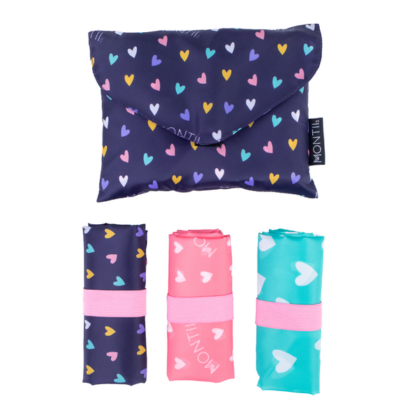 Montiico Shopper Bag Set showing main bag in navy with pastel hearts, containing three shopper bags in navy, pink and aqua
