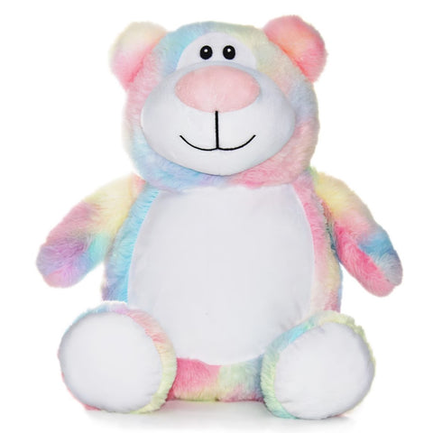 Teddy bear plushie in pastel rainbow colours with a white tummy ready to be personalised