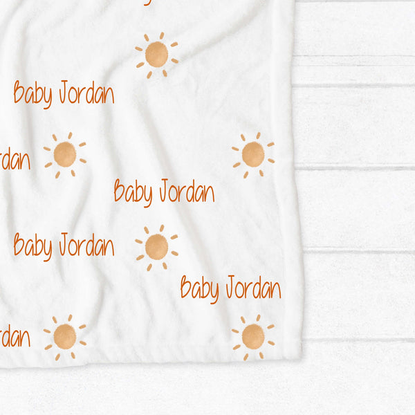 Personalised fleece minky blanket with ochre coloured suns, ideal for gender neutral baby showers