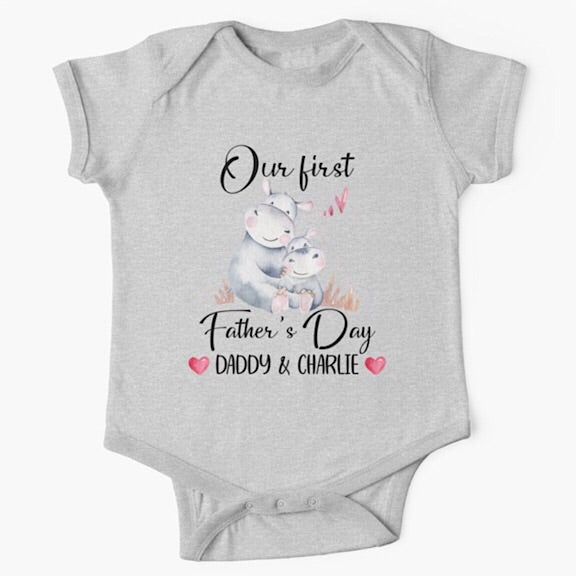 Personalised light grey short sleeved baby onesie bodysuit for daddys first fathers day with the names of both father and child combined with a watercolour painting of a daddy hippopotamus hugging a baby hippo