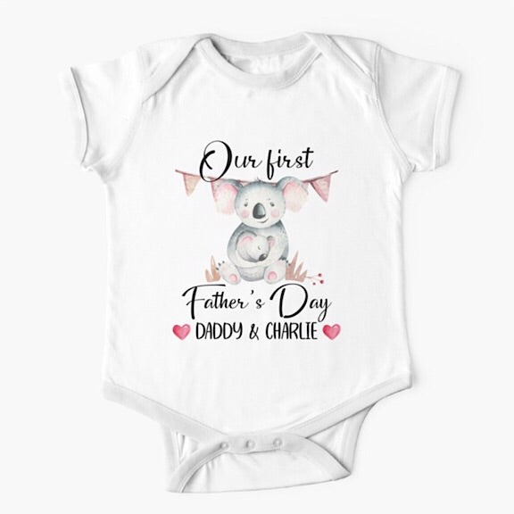 Personalised white short sleeved baby onesie bodysuit for daddys first fathers day with the names of both father and child combined with a watercolour painting of a daddy koala bear hugging a baby koala bear