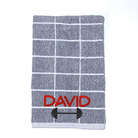 Light grey and white check gym towel or sports towel personalised with a name and dumbbell weight bar