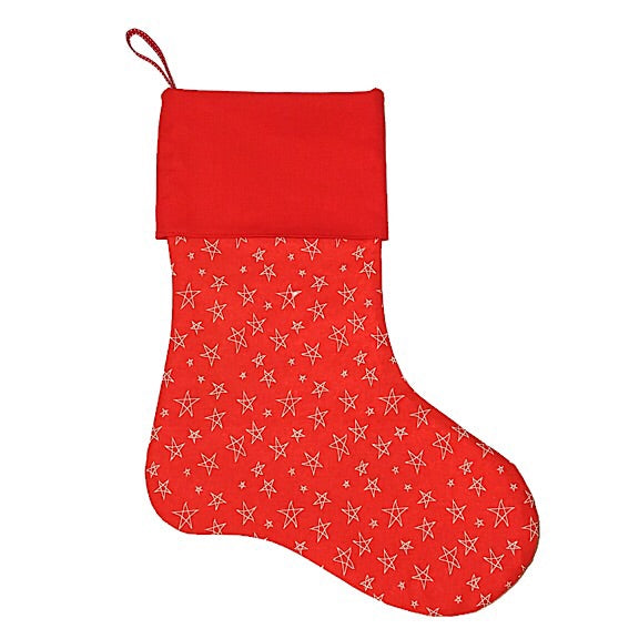 Large Christmas Stocking in red background with cream stars with a large red cuff personalised with a name.