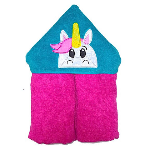 Hooded bath beach swim towel in pink with green hood. Hood has the face of a white unicorn with pink hair and yellow horn appliquéd in the centre. Ready to be personalised with a name.