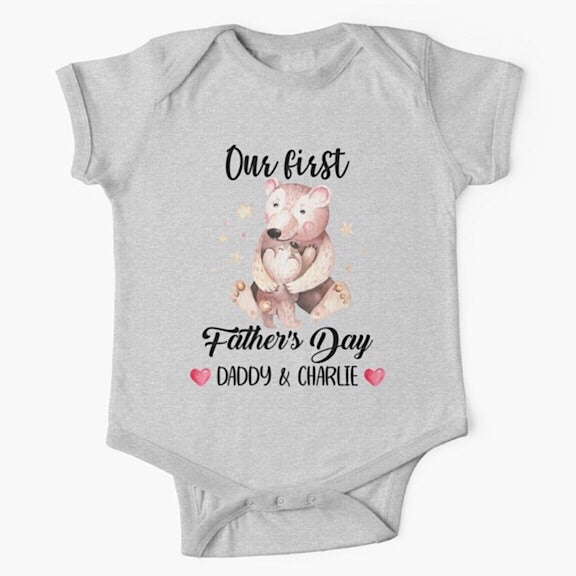Personalised light grey short sleeved baby onesie bodysuit for daddys first fathers day with the names of both father and child combined with a watercolour painting of a papa bear hugging a baby bear