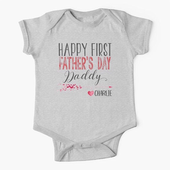 Light grey short sleeved baby onesie bodysuit with the words Happy First Father's Day Daddy in grey and red and personalised with the baby's name