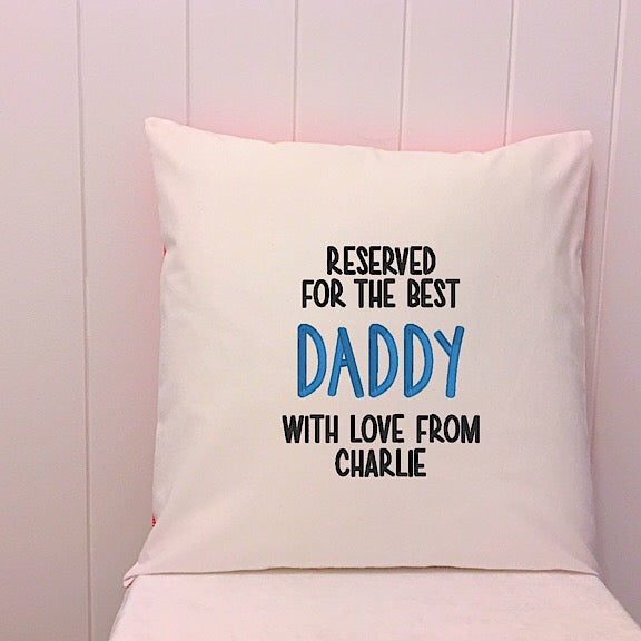 White cushion embroidered with Reserved for the Best Daddy with Love from Charlie perfect for a personalised fathers day present